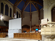 screen at the front of the altar area