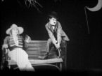 Charlie Chaplin and Edna Purviance sell war bonds