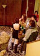 Guests chat in the lobby