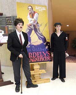 attendees Gina Reilly as Charlie Chaplin and Christna Khan as Buster Keaton