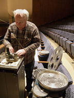 Projectionist Rick Every makes a splice
