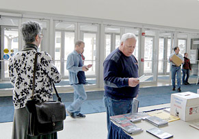 Staff and special guests gather in White Concert Hall lobby, Friday afternoon.