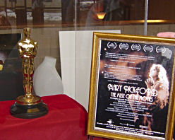 Statuette with poster for Mary Pickford documentary by Nicholas Eliopoulos