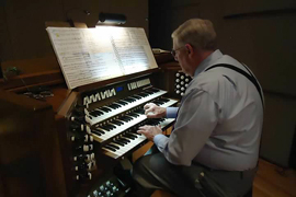 Marvin Faulwell reshurses at the White Concert Hall organ