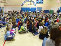About 500 Auburn Elementary students prepare to see a silent film with live accompaniment