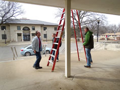 Karl and Trevor set up the tall ladder