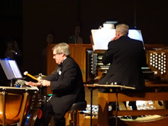 Bob Keckeisen plays percussion, with Marvin Faulwell on the concert hall pipe organ