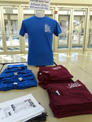 20th Anniversary t-shirts were blue. Maroon t-shirt was from 2015 and sold as bargains.