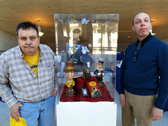 Jim Reid and Ben Model pose with W.C. Fields memorabilia