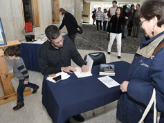 Sergio Delgado signs books A