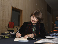 Dr. Harriet Fields signs books