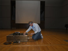 Bill Shaffer runs the DVD projector