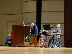 Marvin Faulwell and Bob Keckeisen play prelude before a film-showing