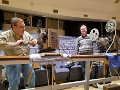 Jim Reid and Bruce Calvert ready the 16mm projectors