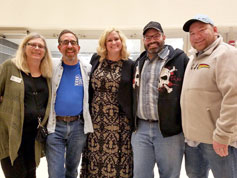 KSFF staff return from the Cinema-Dinner to relieve the faithful volunteers who manned the sales tables — with Nancy Lawrence, Karl E. Mischler Jr. and Melanie Lawrence