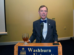 Washburn University President Jerry Farley welcomes diners