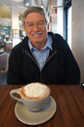 Bill Shaffer relaxes with hot chocolate at P.T.'s Coffee Shop near the Washburn campus on Monday morning