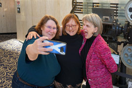 Jane Bartholomew plans a selfie with Denise Morrison and Tracey Goeseel
