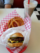 Burger, onion rings and float