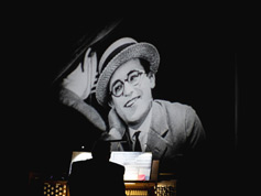 Harold Lloyd on the screen, with musical accompaniment by Marvin Faulwell