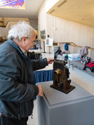 Kenneth Filardo works with his Edison Projecting Kinetoscope