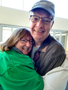 Film historian Denise Morrison gives founder Jim Rhodes a big hug