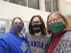 In masks: Jane Bartholomew, Melanie Lawrence and Denise Morrison