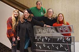These gals are faithful Kansas Silent Film Festival attendees: Wendy Mahaffey, Kellee Pratt, Candy Pfaltzgraf, Kelly Kitchens Wickersham, and Michelle Sabastoan Price.