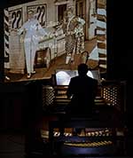 (More projected images receive live organ accompaniment.