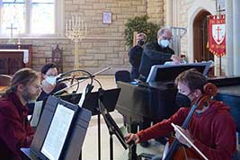 Bob Keckeisen joins Mont Alto Motion Picture Orchestra as they practice accompaniment for the afternoon agenda.