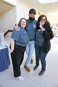 Jane Bartholomew, Mike Sershen of the Washburn University custodial staff, and Melanie Lawrence