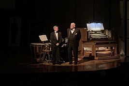 Bob Keckeisen, percussion, and Marvin Faulwell, organ, take a bow after accompanying Cecil B. DeMille's The Ten Commandments on Saturday evening