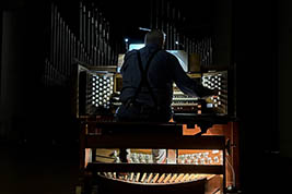 Marviw Faulwell practices over Friday noon-hour on the concert hall organ