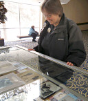 Cookie looks at collectibles, shared by Doug Moore
