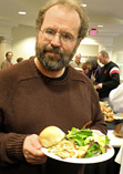 Rodney Sauer of Mont Alto Motion Picture Orchestra nears the end of the buffet line