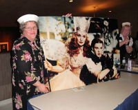 Enid and her Wizard of Oz poster gift. Zandra watches