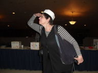 Carol searches for an empty seat