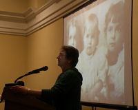Melissa with photo of her grandmother and great aunts, the Talmadge sisters