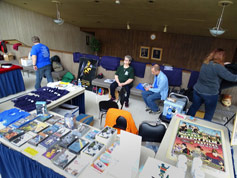Voluteer help adds finishing touches to set-up
