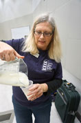Nancy Lawrence pours iced punch