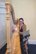 Erin Wood provides dinner music using her harp