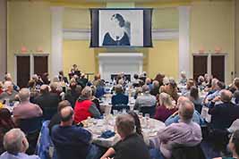 Attendees enjoy images that are a part of Melissa's talk about her silent-film-stars-family