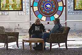 Break-time gives attendees an opportunity to talk with event staff and consider items displayed for possible purchase