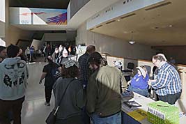 Break-time gives attendees an opportunity to talk with event staff and consider items displayed for possible purchase