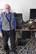 Ken poses for a photo of himself with his displayed Motion Picture Projector