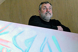 Brian Sanders looked up-and-down at the top of the stairs to the balcony. He looks SO COOL!